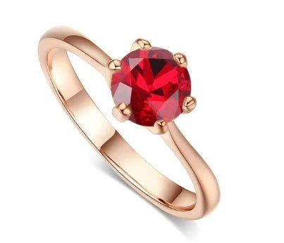Close-up of a beautiful rose gold ring with sparkling zircon stones