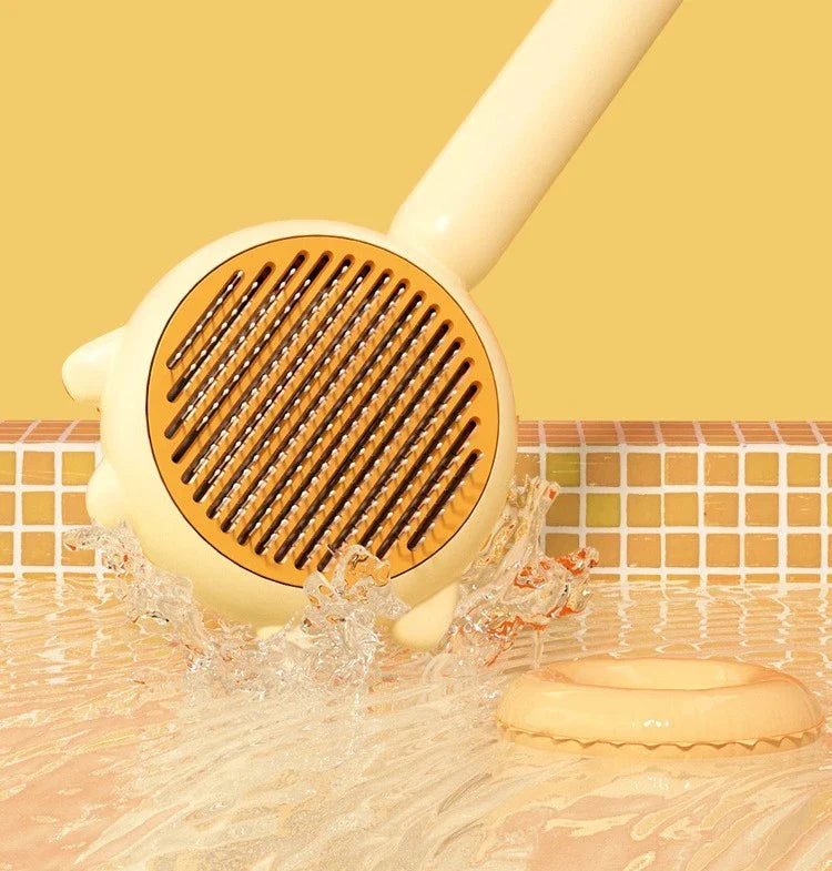 Premium pet grooming brush featuring dual-action hair removal and soothing massage for cats and dogs