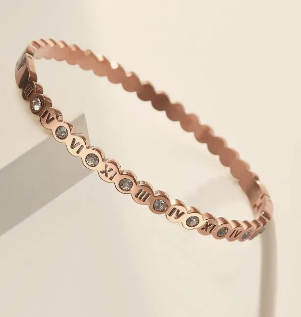 Korean style titanium steel bracelet with a numerical design element on an adjustable band.