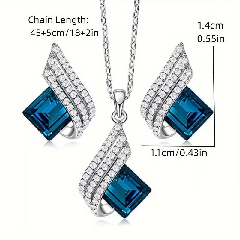 Necklace and earring set with alloy pendant and cross chain in two colour options.