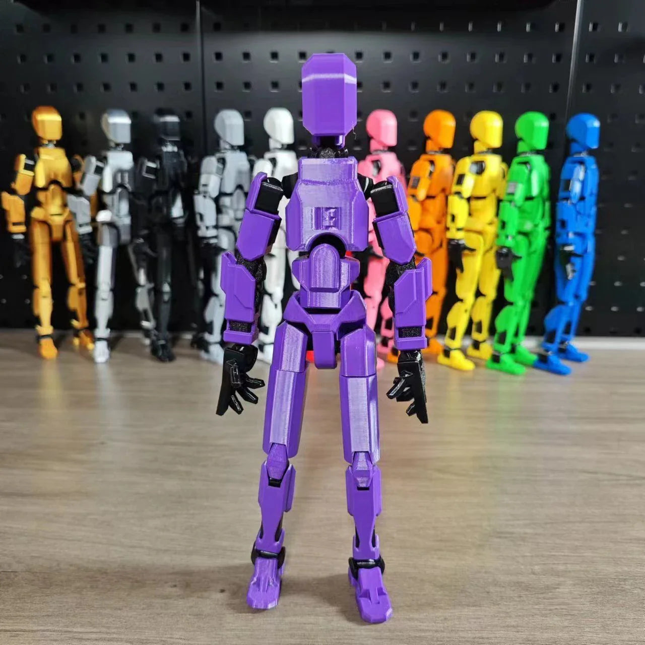 Customizable 3D printed multi-jointed action figure robot toy in various vibrant colors