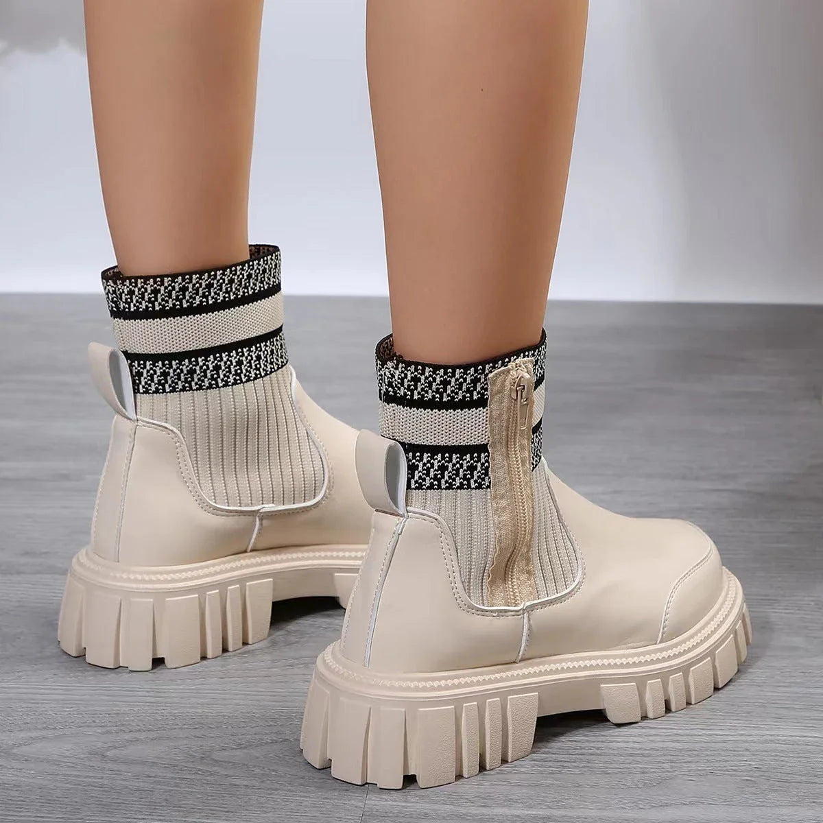 Stylish mid-calf boots with zipper closure, non-slip rubber sole, and knitted patchwork upper in beige, black, and brown colors.