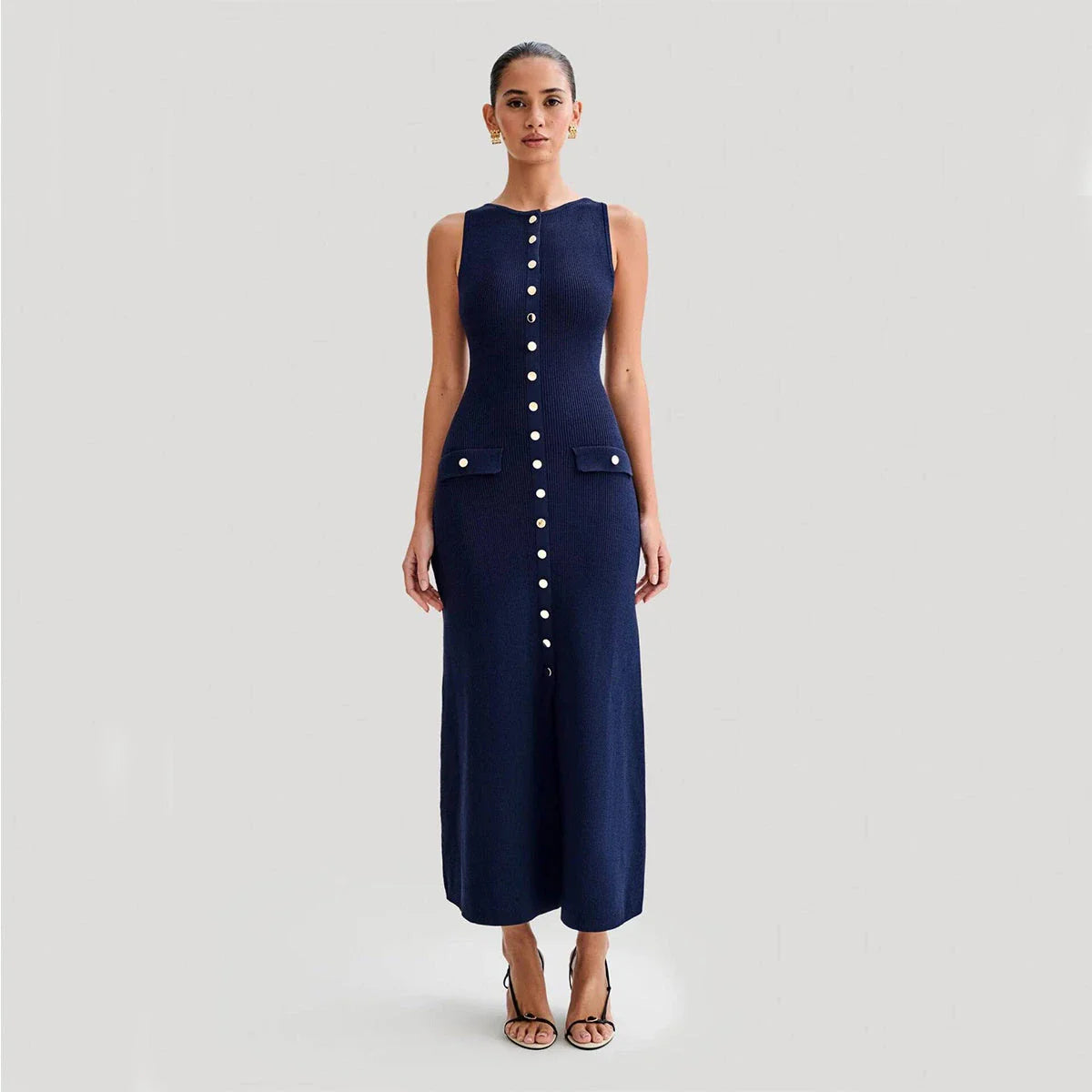 Sleeveless knit dress in apricot and blue colors, showcasing a slim, flattering silhouette and premium polyester construction