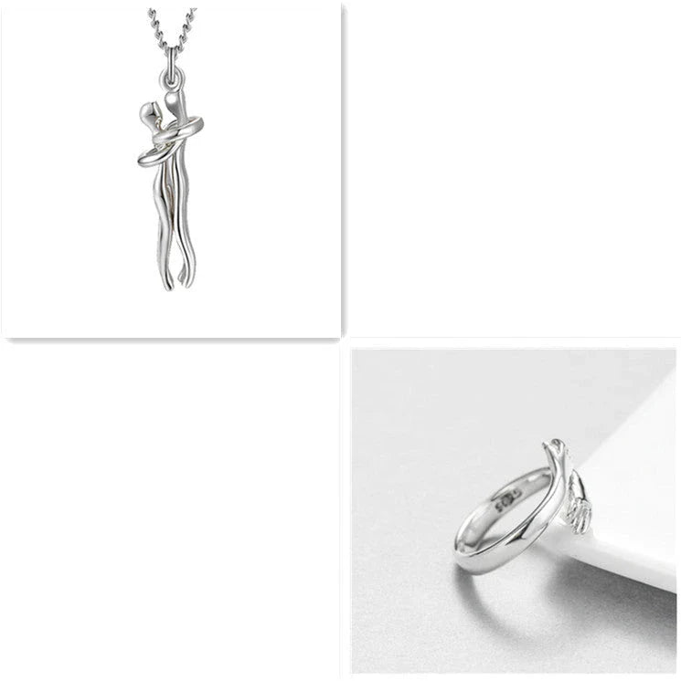 Stylish embracing pendant necklace in various colors, including rose gold, white black, black gold, and more. Minimalist design with a delicate chain.