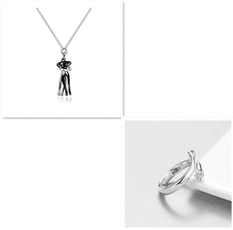 Stylish embracing pendant necklace in various colors, including rose gold, white black, black gold, and more. Minimalist design with a delicate chain.