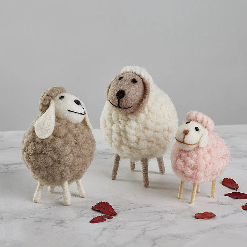Plush sheep figurines in various colors and sizes, perfect for home decoration and gifting