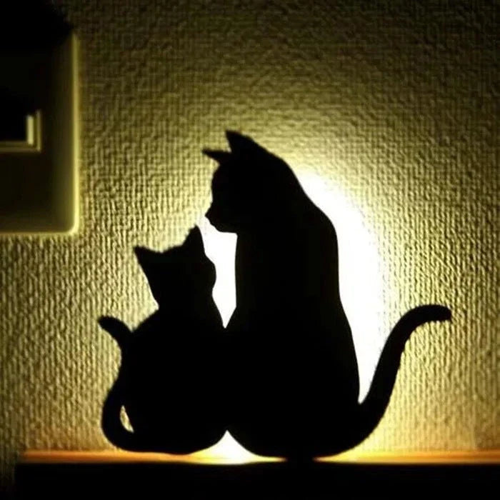 A stylish cat-themed LED lamp that automatically lights up when it detects sound, creating a cozy, ambient glow in a room.