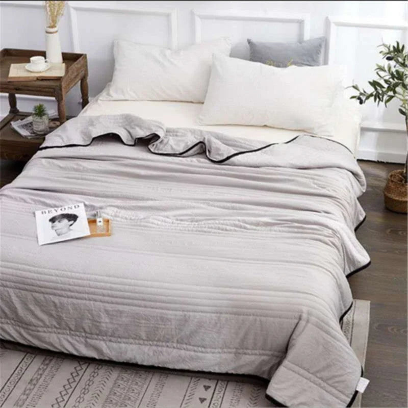 Premium all-season cooling comforter with soft, breathable fabric and plush fill for comfortable sleep
