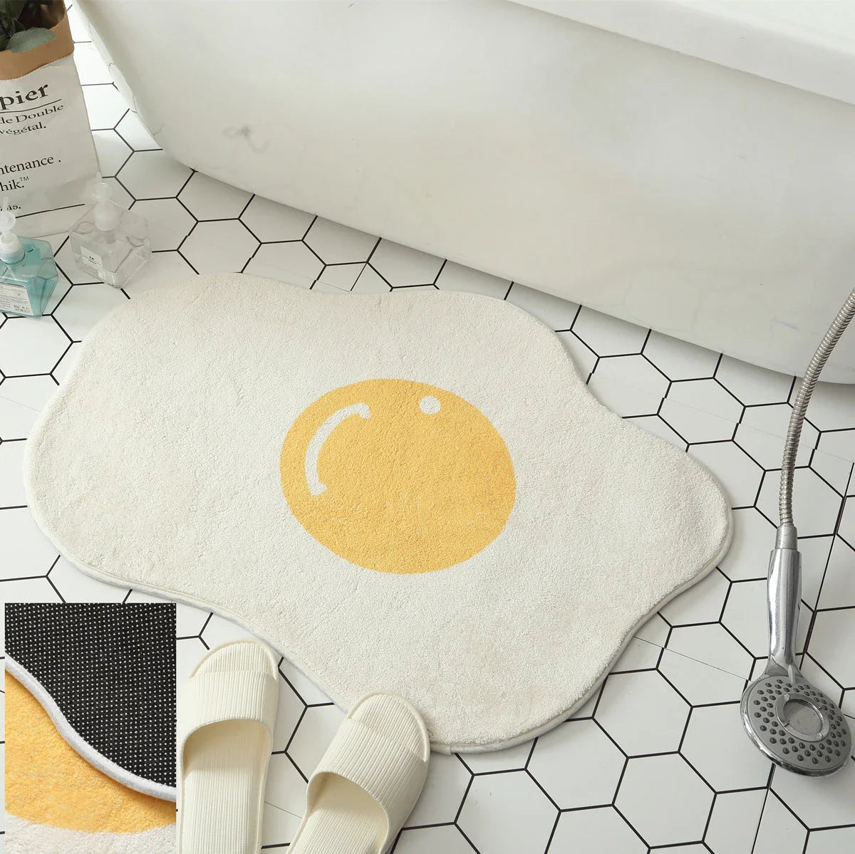 Stylish and absorbent egg-shaped doormat in various sizes and colors, made of plush polyester with a non-slip rubber backing