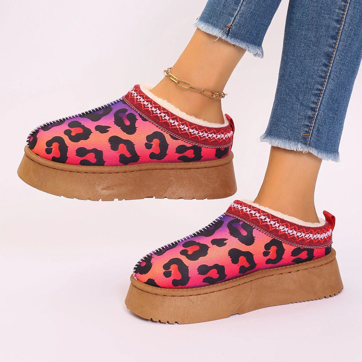 Cozy winter ankle boots featuring festive Christmas prints and plush lining for women