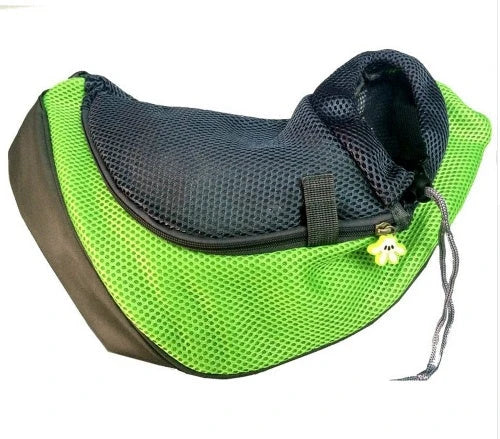 A comfortable and stylish pet sling bag with padded mesh and leather details, allowing hands-free travel for pet owners.