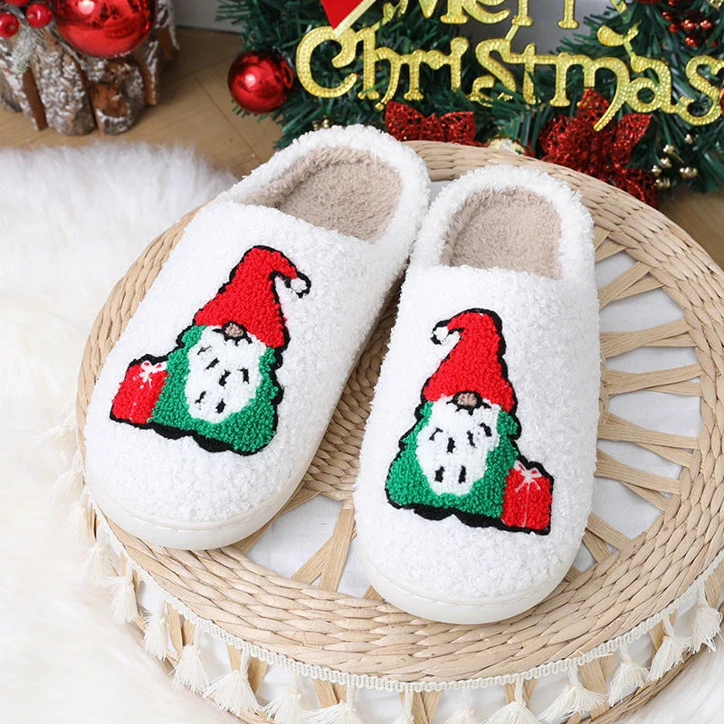 Cozy Santa Claus-themed slippers with plush upper and anti-slip soles for comfortable indoor wear during the holidays