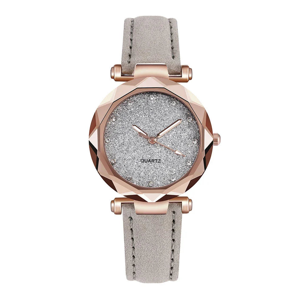 Elegant women's wrist watch with a captivating starry sky dial and leather strap, suitable for any occasion.