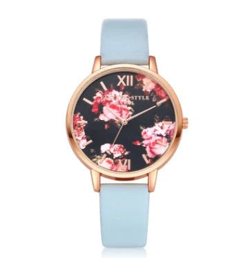 Elegant rose gold women's watch with leather strap and love heart design