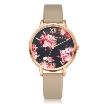 Elegant rose gold women's watch with leather strap and love heart design