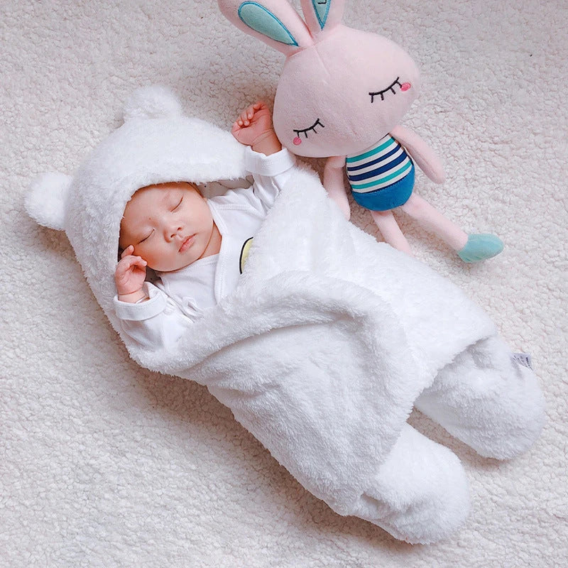 Cozy cotton baby sleeping bag with soft, breathable interior and warm, insulating outer layer