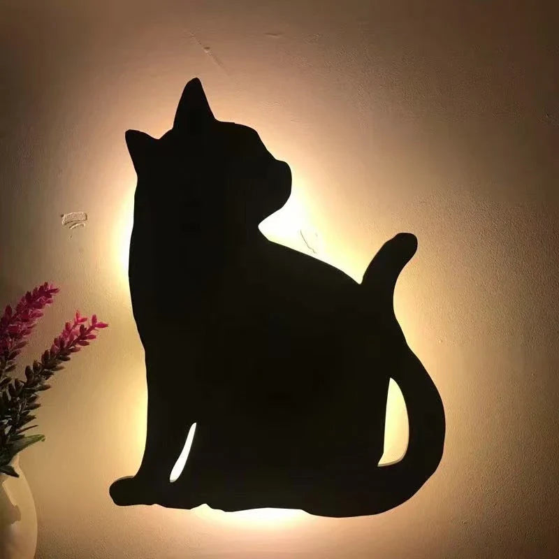 A stylish cat-themed LED lamp that automatically lights up when it detects sound, creating a cozy, ambient glow in a room.