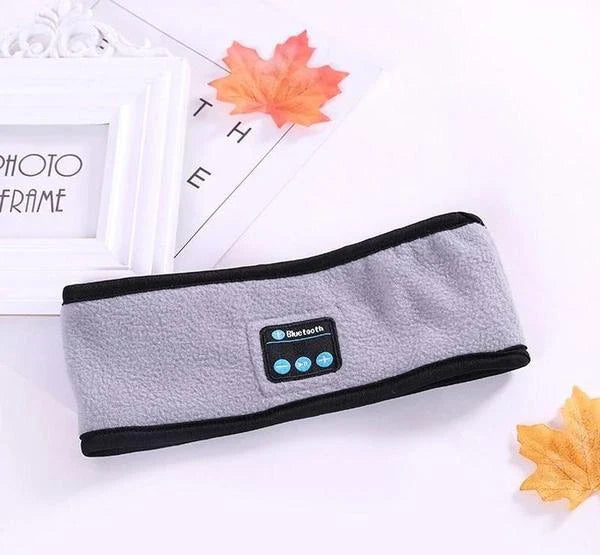 Wireless Bluetooth headband in multiple colours, featuring knitted fabric, built-in microphone and long-lasting battery for outdoor fitness and yoga activities.
