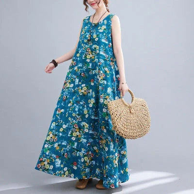 Elegant cotton linen dress in classic colours, featuring a sleeveless design and a loose waist silhouette for a flattering fit.