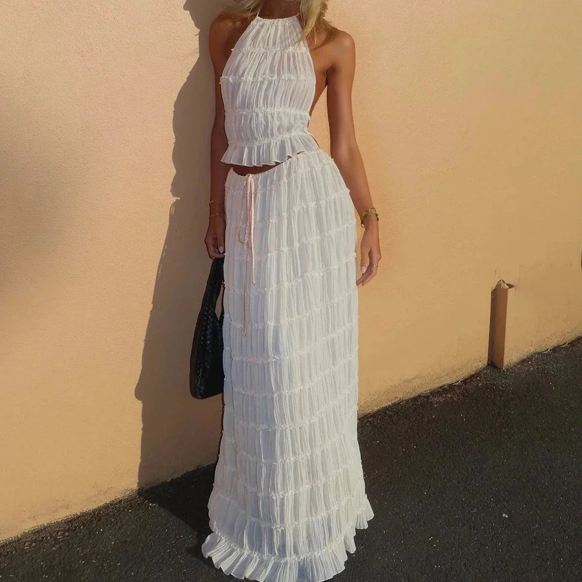 Chic backless halter top and flowing pleated maxi dress set in various vibrant colors