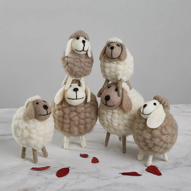 Plush sheep figurines in various colors and sizes, perfect for home decoration and gifting