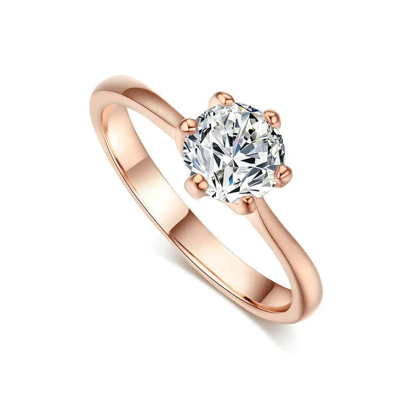 Close-up of a beautiful rose gold ring with sparkling zircon stones