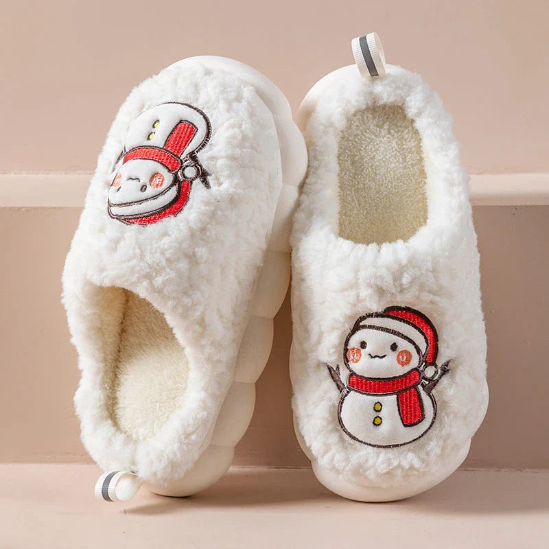 Cozy snowman-themed slippers with plush interior and thick, anti-slip soles for warm, comfortable indoor wear
