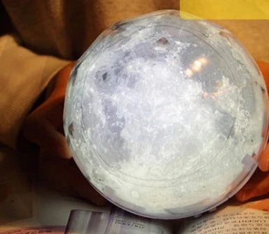 Galaxy Projection Lamp casting mesmerizing celestial imagery in a cozy home setting