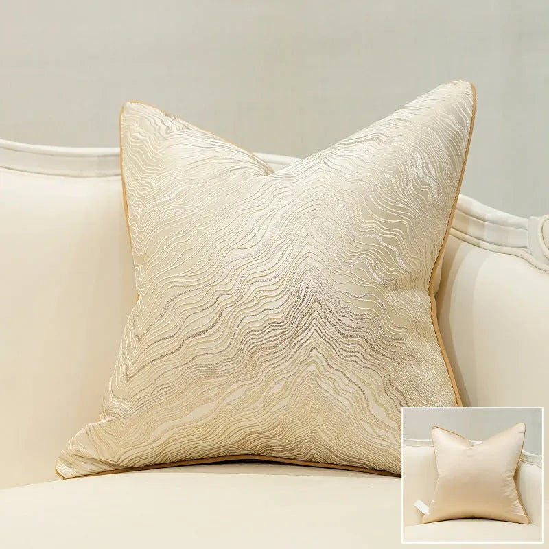Corrugated stripe and diamond pattern cushion covers in green, blue, grey, and beige colours.
