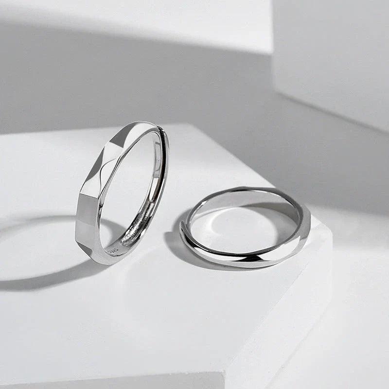 Elegant S925 sterling silver rings with a hidden love pattern design, adjustable sizing for a personalized fit.