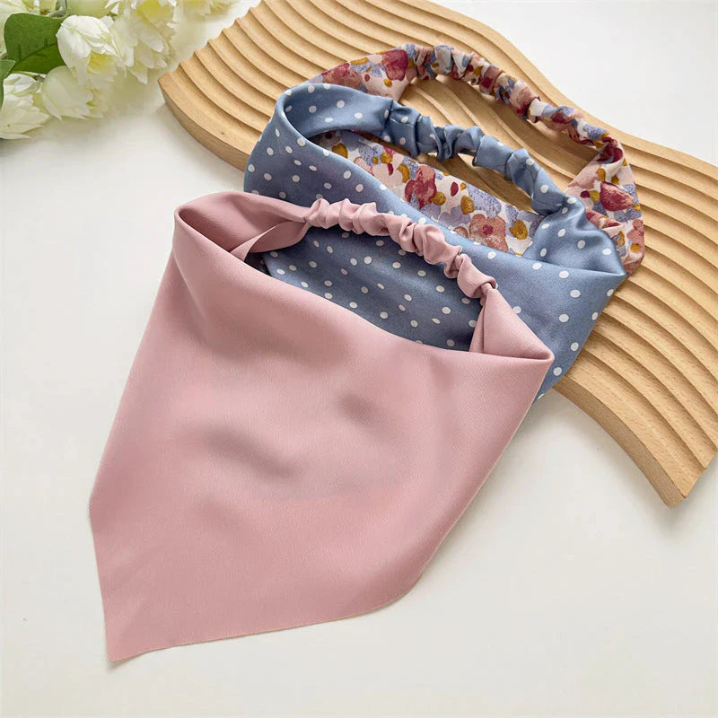 Elegant white satin triangle hair scarf with floral pattern, suitable for versatile styling as a headband, scarf, or bandana