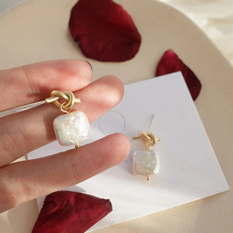 Stunning natural pearl earrings in a modern geometric design, crafted from premium 925 sterling silver