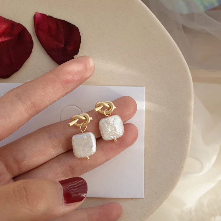 Stunning natural pearl earrings in a modern geometric design, crafted from premium 925 sterling silver