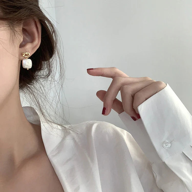 Stunning natural pearl earrings in a modern geometric design, crafted from premium 925 sterling silver