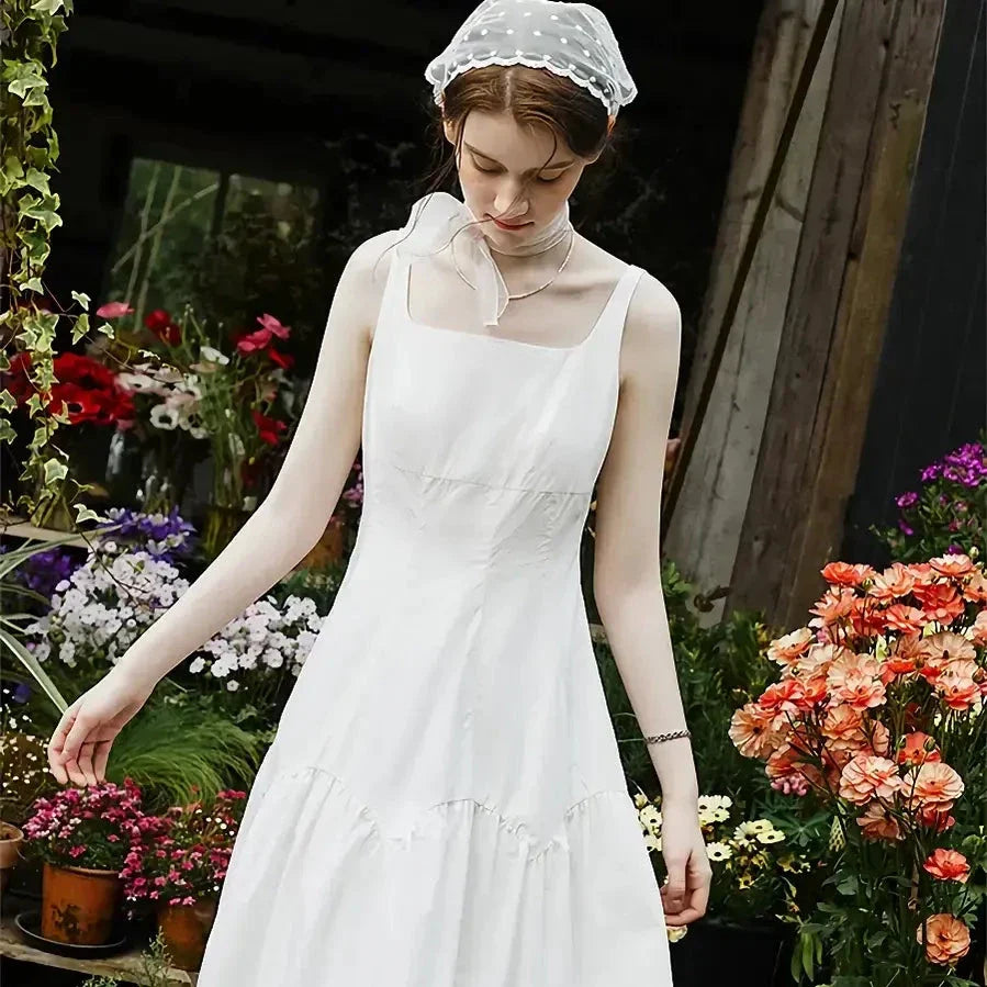Elegant French white suspender long dress made from premium 100% cotton for effortless style