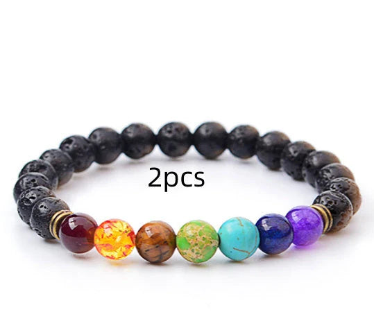 Handcrafted beaded bracelet with seven chakra-representing beads, designed to promote balance and well-being.