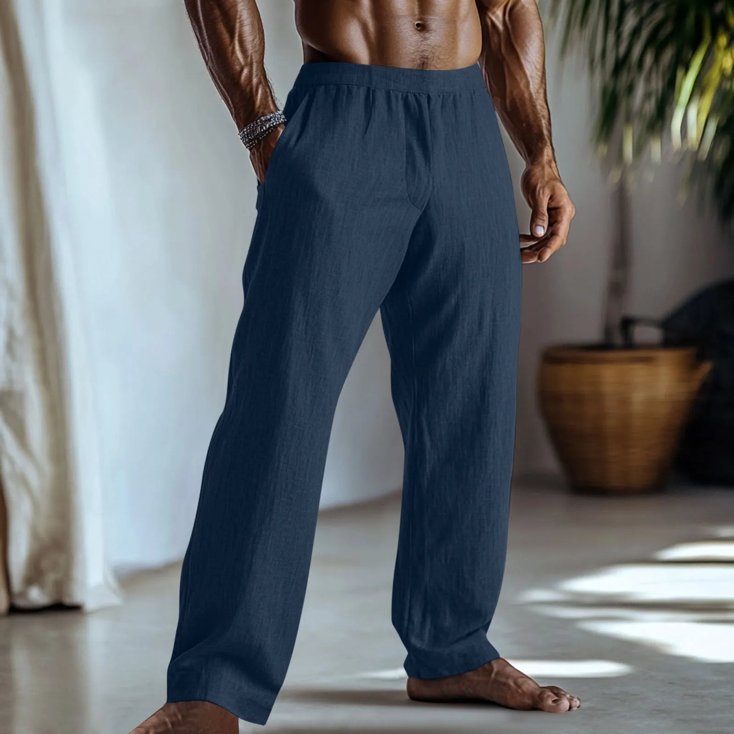 Straight leg cotton linen trousers in light green, shown with side pockets and a casual fit.