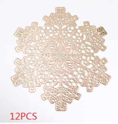 Snowflake-patterned heat-resistant placemats in gold and silver colors, ideal for holiday table settings and decor