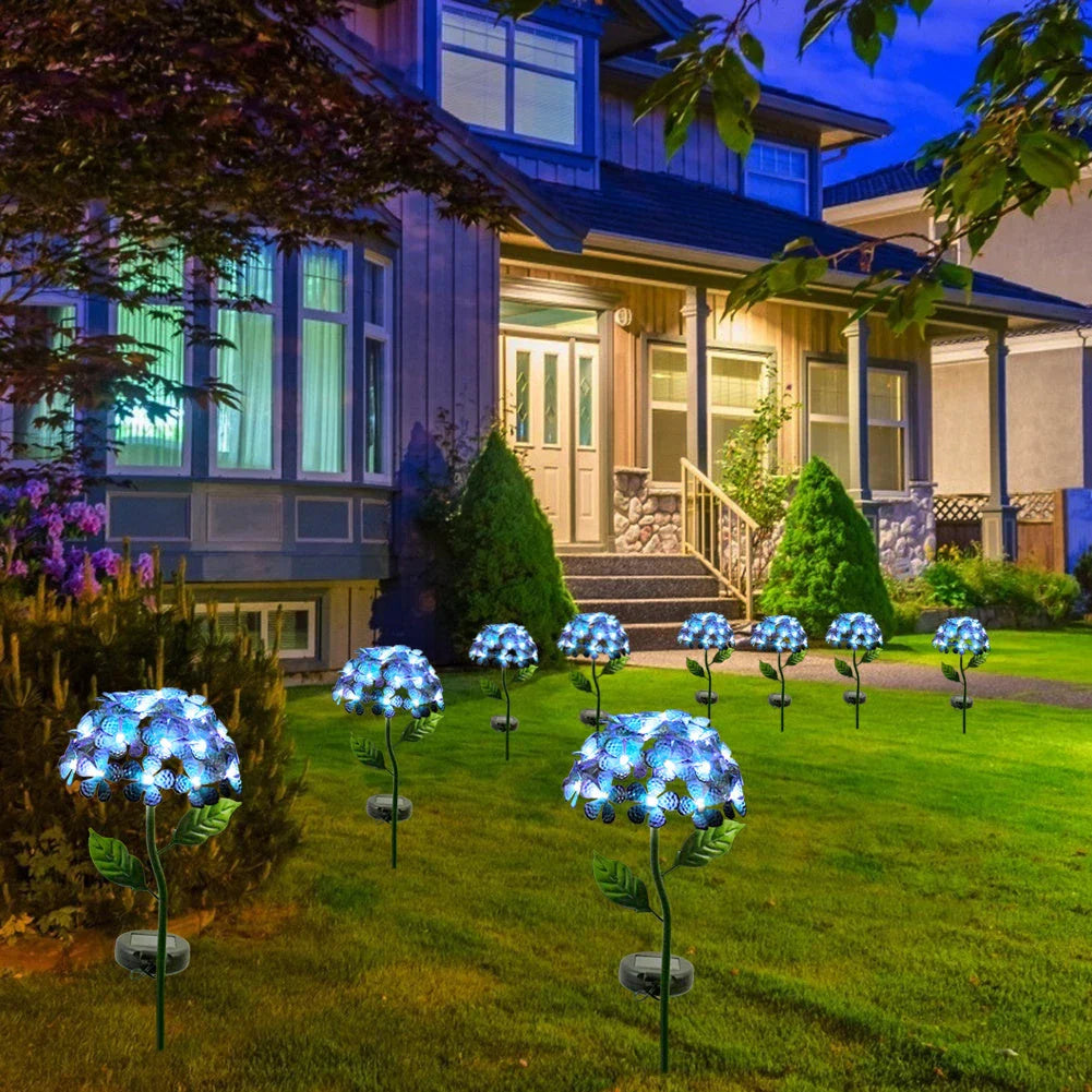 Solar-powered hydrangea garden lights in various colors placed outdoors to provide ambient lighting
