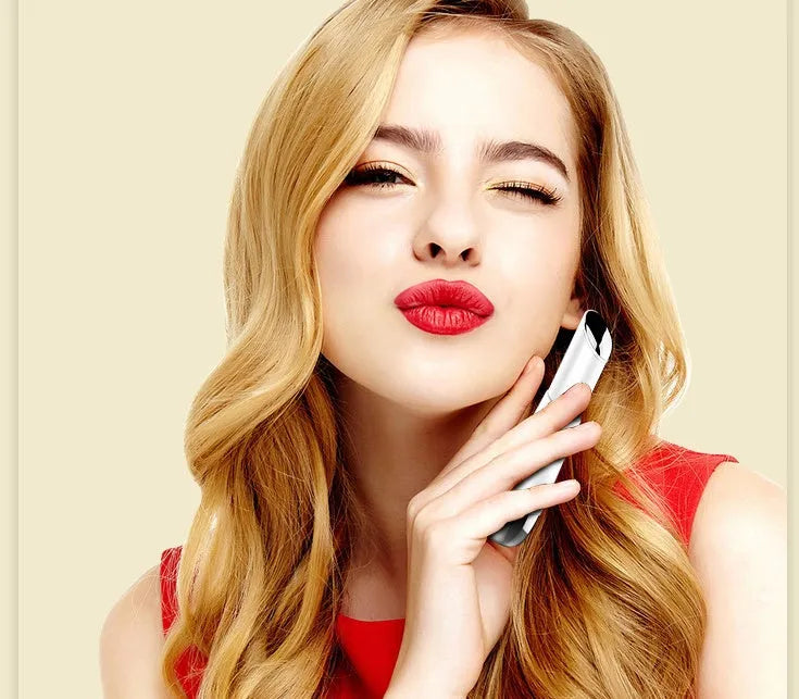 Mini electric vibration eye massager pen in pink and white with 40°C thermal head and USB charging cable