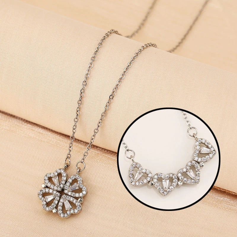 Elegant four-leaf clover pendant necklace made of premium titanium steel with a captivating diamond inlay design
