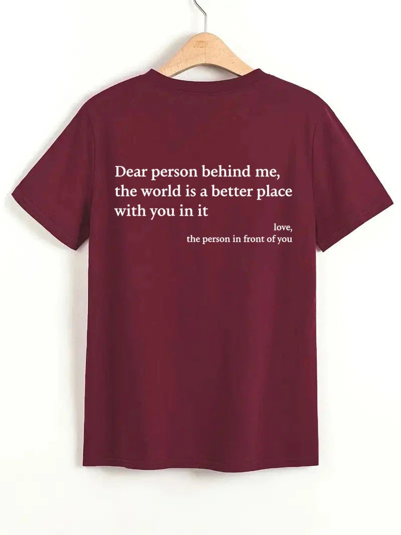 Stylish women's graphic t-shirt with trendy slogan, featuring a vibrant print design and comfortable short sleeve silhouette.
