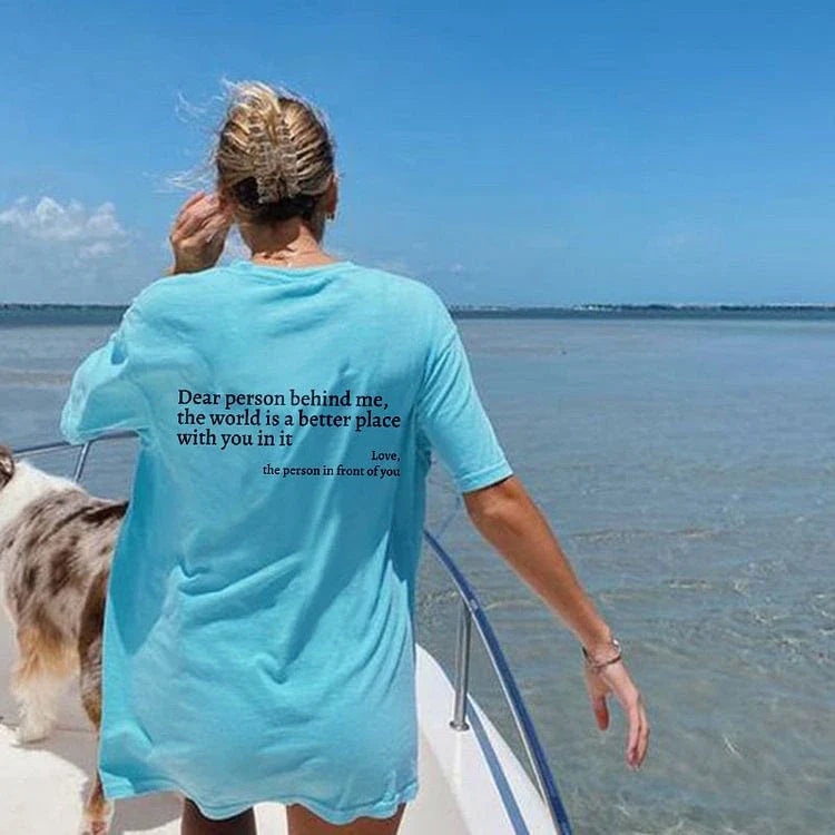 Stylish women's graphic t-shirt with trendy slogan, featuring a vibrant print design and comfortable short sleeve silhouette.