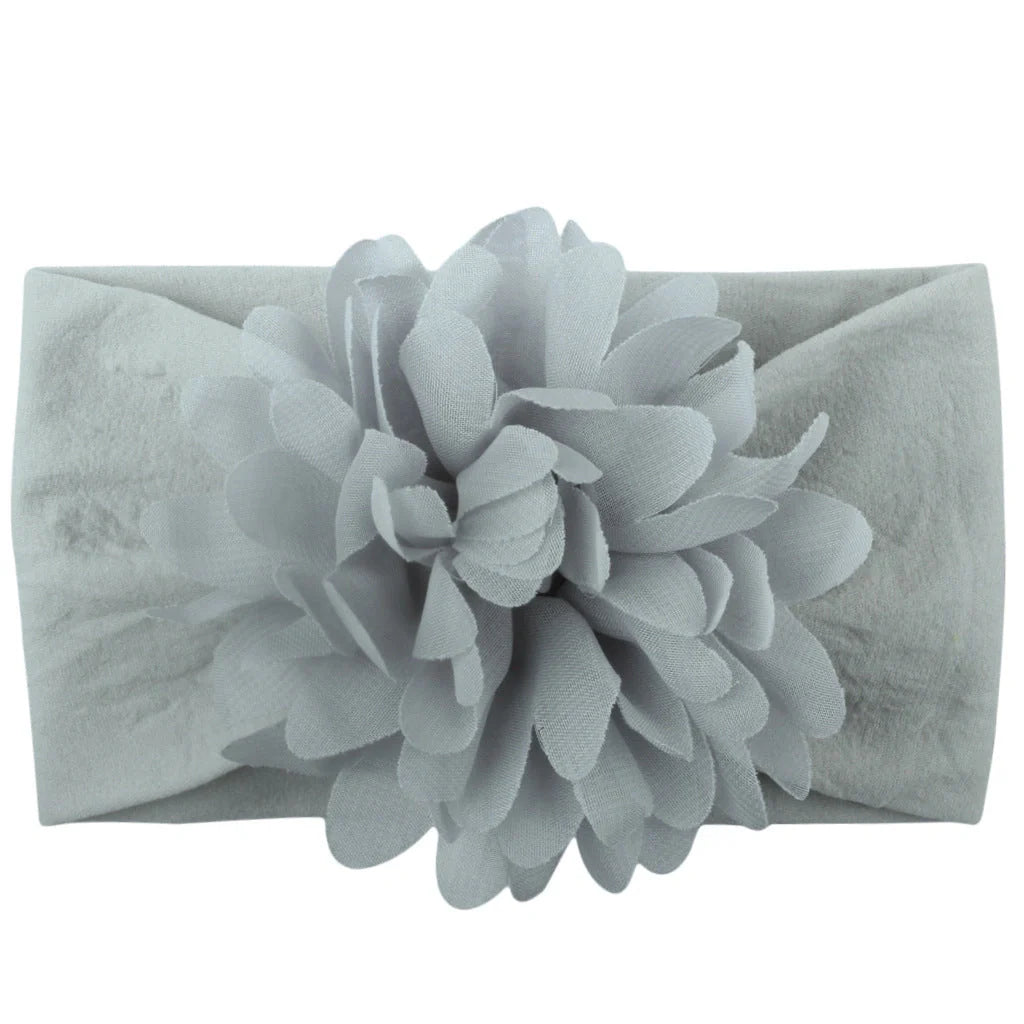 Handcrafted chiffon flower baby headband for little princesses, available in various colours and styles.