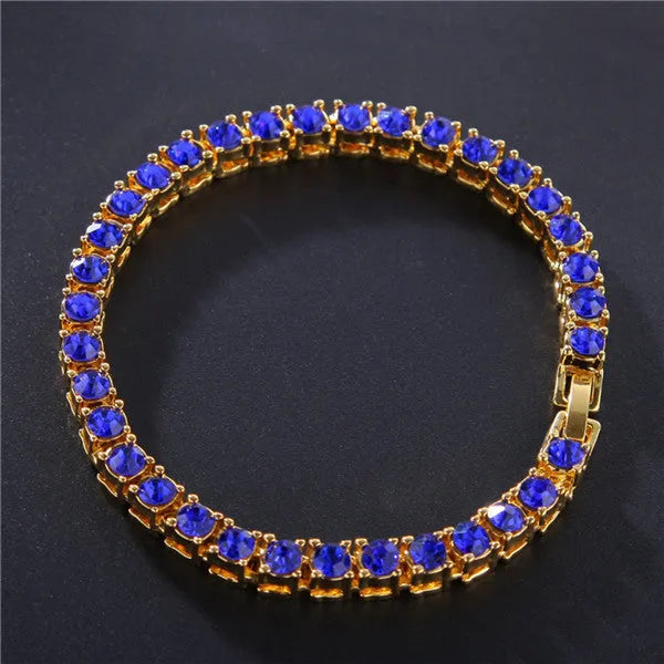 Men's silver alloy link bracelet with a row of clear rhinestones, shown on a wrist.