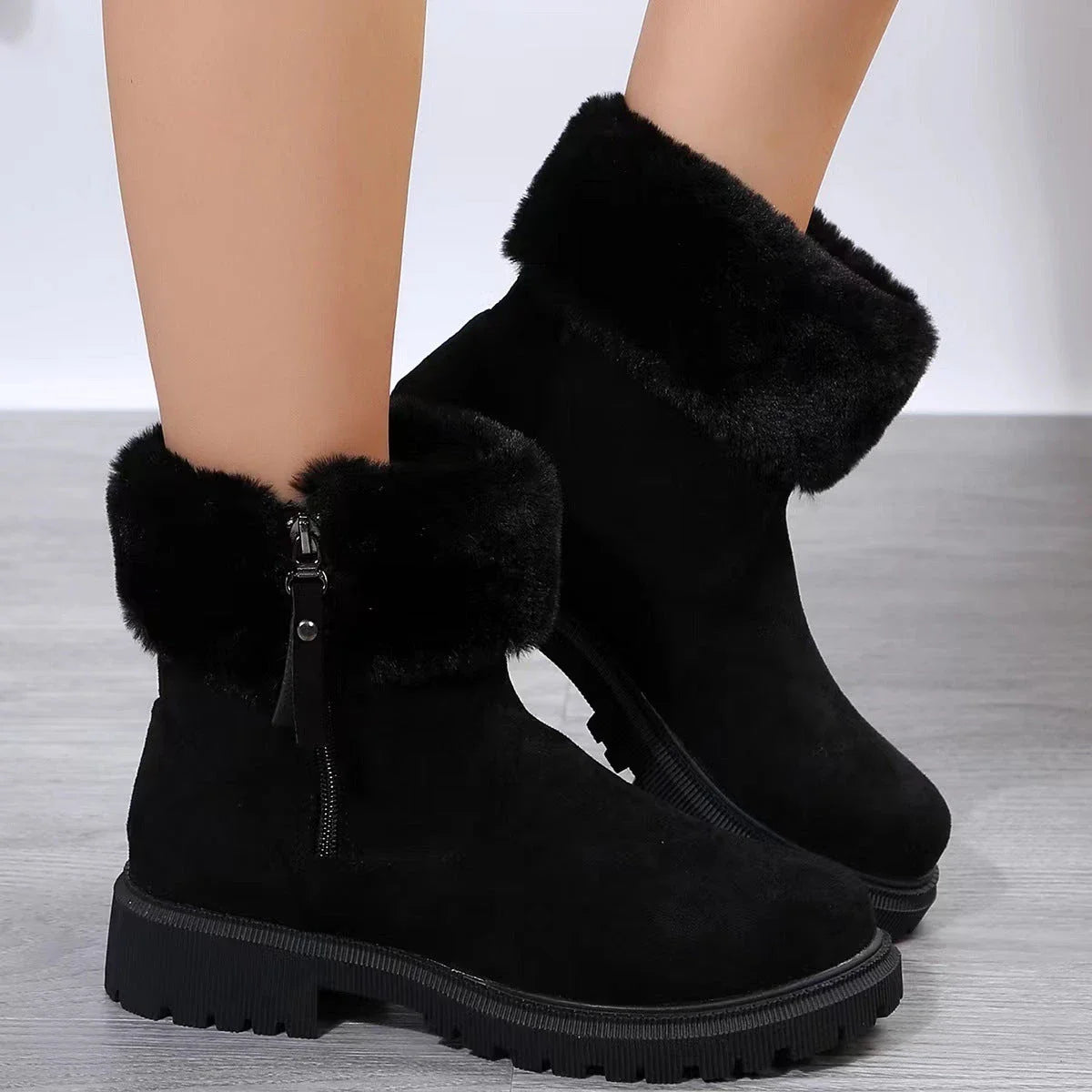 Cozy winter boots with side zipper, suede upper, and rubber sole for outdoor activities