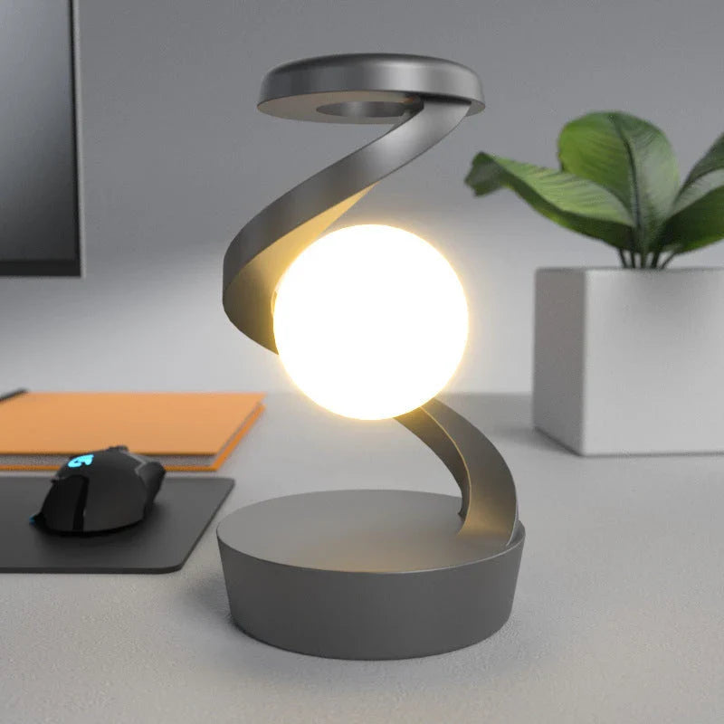 Stylish Rotating Moon Lamp with Wireless Phone Charging - Captivating Desk Accessory with Soothing Lighting and Convenient Wireless Charging