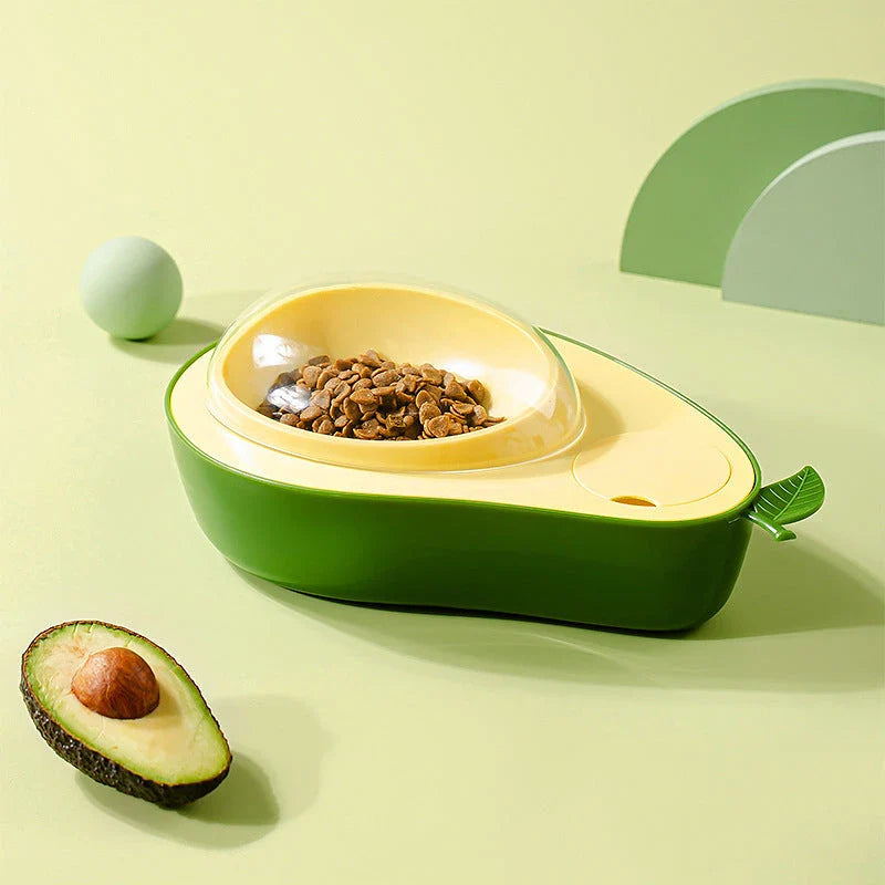 Avocado-shaped automatic pet food and water dispenser for dogs and cats, featuring a raised feeder, slow-feed bowl, and adjustable water flow