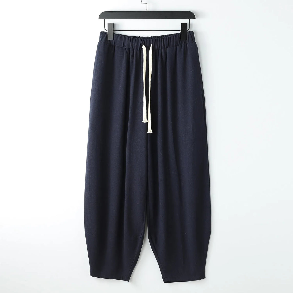 Loose linen harem pants with ankle ties in neutral colours for plus sizes