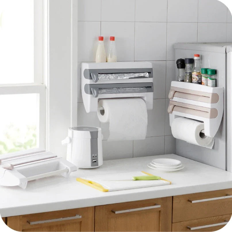 Multifunctional kitchen wall organizer with cling wrap, foil, and paper towel storage compartments and built-in cutting tools